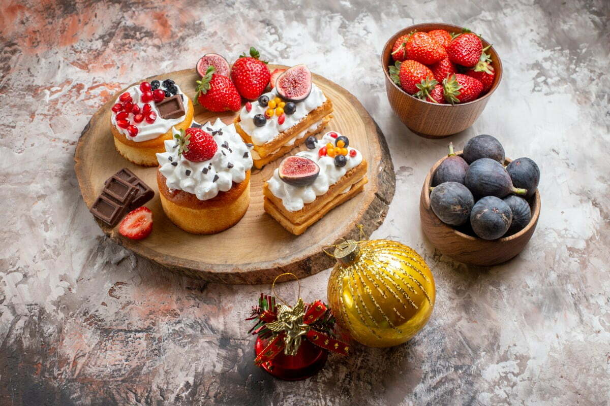 front view delicious cakes with fresh fruits light background christmas cake dessert color biscuits 1 My Blogger Income
